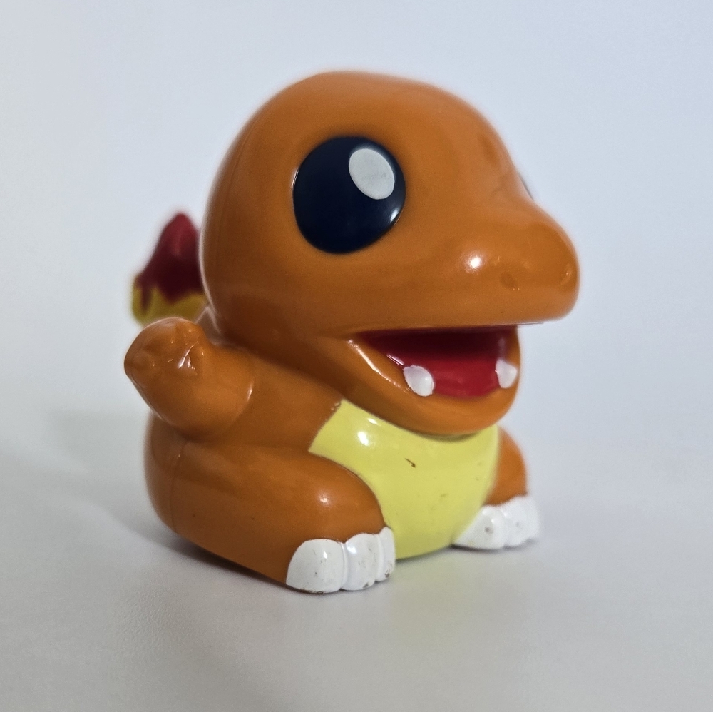 Tomy Pokemon Charmander Wind Up Wheel Toy